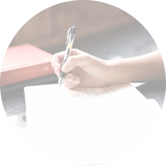 image of hand writing in journal